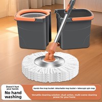 Serpillère rotative manuelle à double action avec seau amovible et panier en acier inoxydable pour un nettoyage domestique complet et sans effort