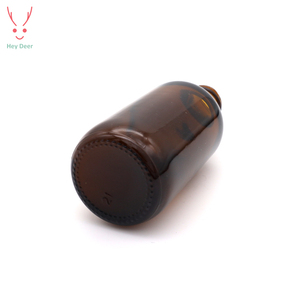 Flacone contagocce in vetro ambrato Boston Round da 2 once con tappo in bachelite nera - Product Image 6