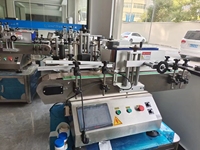 Prix de la machine de remplissage et d'étiquetage de liquides en bouteilles rondes, machine d'étiquetage de bouteilles, machine de remplissage, de bouchage et d'étiquetage de table