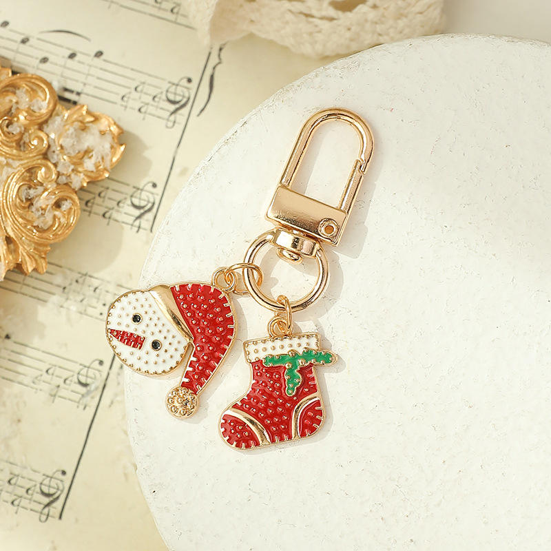 พวงกุญแจโลหะคริสต์มาส-มนุษย์หิมะและถุงเท้า
