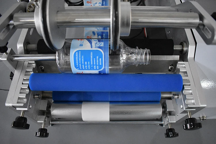 Cosmetic Food Juice Manual Bottle Labeler Semi Auto Label Roller Machine In Small Workshop