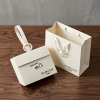 Sac cadeau en papier blanc imprimé sur mesure avec poignée en corde, sac de shopping, emballage de vente au détail, boîte cadeau assortie, emballage cadeau, vente en gros