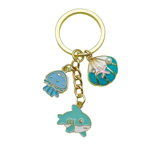 Llaveros personalizados <span class=keywords><strong>de</strong></span> la serie Ocean con conchas, estrellas <span class=keywords><strong>de</strong></span> mar y pez payaso: Un regalo para el chico <span class=keywords><strong>de</strong></span> la <span class=keywords><strong>novia</strong></span> - Product Image 2