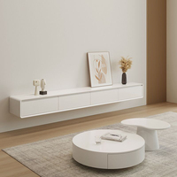 Table basse ronde de salon au design artistique de luxe, ensemble table basse et meuble TV en bois simple pour appartement moderne