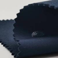 A prueba de viento cálido transpirable 4 vías estiramiento impermeable poliéster Softshell tela para traje de esquí chaqueta