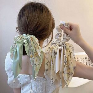 Accessoires de cheveux pour mariage : Chouchous coréens à nœud papillon, élastiques perlés et imprimés de fleurs - Product Image 1