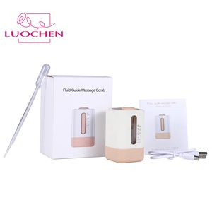 หวีนวดหนังศีรษะ 2-in-1 พร้อมที่จ่ายน้ำมันบำรุงผมและแปรงสำหรับใช้ในบ้าน (ขายส่ง) - Product Image 1