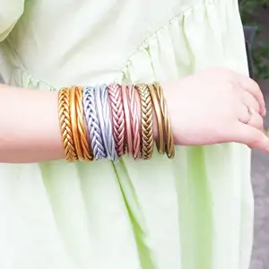 NEW Arrival Beautiful handmade Buddhists Plastic silicone tube gold foil Jelly bangles woven bracelet