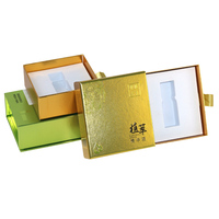 Boîte cadeau personnalisée en or et vert métallisé avec plateau intérieur en mousse pour l'emballage de marques de produits à base de plantes haut de gamme