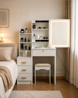 Coiffeuse rose avec miroir LED et station de charge intégrée, armoire de rangement modulaire avec panneau perforé pour chambre d'adolescent.