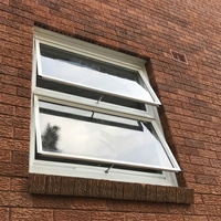 Fenêtres à auvent manuelles en aluminium à double vitrage trempé insonorisées modernes, faciles à installer pour hôtels et appartements
