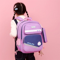 Sac à dos scolaire élégant et polyvalent à roulettes pour garçons et filles ; Grande capacité, protection de la colonne vertébrale, portable, résistant à l'eau