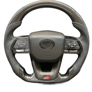 Volant en fibre de carbone pour Toyota LC300 Alphard Série 80 Hilux Land Cruiser Crown – Amélioration et personnalisation automobile - Product Image 1