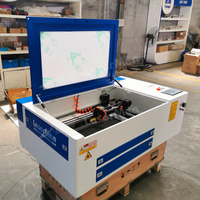 Vente flash : Machine de gravure laser CO2 6040, système Ruida, machine de découpe laser acrylique 4030, tube laser bois directement de l'usine