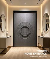 Porte d'entrée double en fonte d'aluminium YDNCN avec relief circulaire sculpté, panneau texturé mat, style villa européenne classique, résistant à l'eau