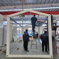 Maison conteneur modulaire préfabriquée et démontable de 20 pieds en panneaux sandwich d'acier, pour usage bureautique, design moderne, emballage plat