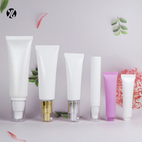 Tube cosmétique rond blanc vide avec bouchon pompe doré/argenté pour lotion/sérum visage/yeux, emballage personnalisé avec logo sérigraphié