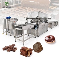 Machine à recouvrir les beignets glacés au chocolat, les dattes, les raisins, les cacahuètes ou la sauce pour barres chocolatées
