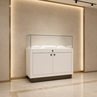 Comptoir de présentation de bijoux en verre GZowin avec éclairage LED, vitrine de vente au détail durable pour les bijouteries
