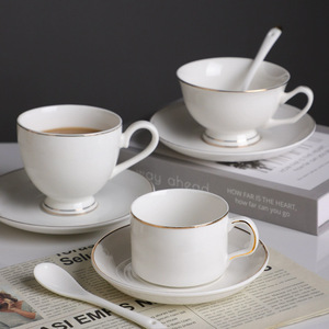 Taza y Platillo de Café de Porcelana China Blanca Pura con Logotipo Personalizado, Diseño Moderno y Simple, Capacidad de 201-300 ml, Acabado Dorado - Product Image 1