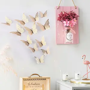 Içi boş kelebek 3D içi boş Metal kelebek duvar dekorasyonu ev oturma odası üç boyutlu dekoratif kelebek Sticker