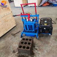 Machine à fabriquer des blocs de béton à essence économique avec moteur pour la construction de logements ruraux