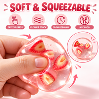 Balle anti-stress souple en plastique, faite à la main, à l'huile de coco et à la vaseline, à l'aspect fraise, hautement transparente, non rebondissante
