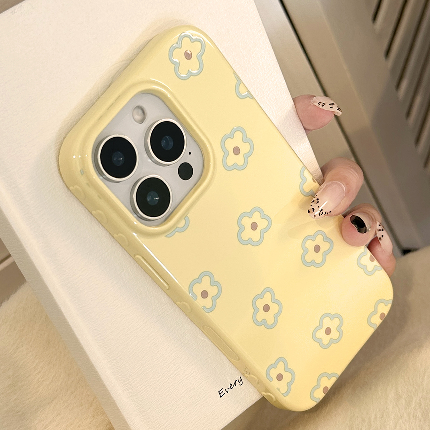 Lemon yellow with brown core and blue lines