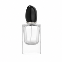 Flacon de parfum en verre mat personnalisable de 50 ml, avec couvercle décoratif en forme de galet, impression sérigraphique et marquage à chaud