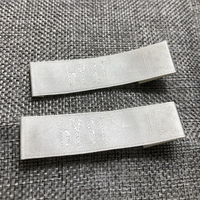 Coudre Sur Le Charme Motifs Logo Pli Central étiquette Lavable Tissu Machine Tissée Étiquettes Pour Vêtements