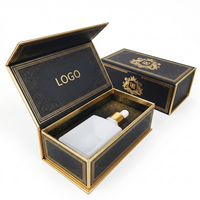 Étui rigide en carton noir obsidienne de luxe avec doublure en feuille d'aluminium pour l'emballage de whisky et de champagne haut de gamme