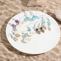 2024 nouveau Design boucles d'oreilles en pierre naturelle ensemble plaqué or conque lunette réglage océan Style perle coquille bijoux en alliage de Zinc