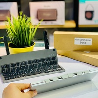 Keyboard dengan dudukan ponsel, ultra-tipis lipat Mini gigi biru 61 tombol nirkabel dengan dudukan yang dapat diisi ulang 2 lipat