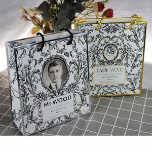 Custom Paper Bags Shopping Clothing Packaging Handbags Foldable Gift Paper Bags With Your Own Logo - Product Image 1