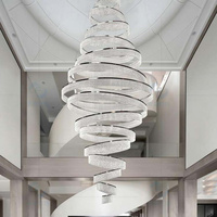 Lustre en cristal à anneaux spirales, luminaire suspendu sur mesure à plusieurs boucles pour hall d'hôtel, atrium et plafond haut