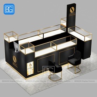Comptoir de parfum en verre Armoire de présentation verrouillable avec cadre en acier inoxydable Support de parfum d'accent doré Meubles de magasin de détail