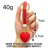 En gros, Porte-clés et breloque de sac en strass en forme de boule de fraise mignonne et scintillante, petit cadeau pour femmes, pour sac à main et clés de voiture