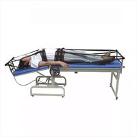 Fabricant de lits Traction Vente en gros OEM Table chiropratique Portable à traction à réglage stationnaire Fer 200 Lit chiropratique