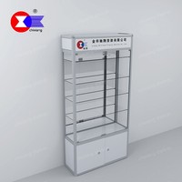 Vitrine en verre pour magasin de bijoux à lumière LED Vitrine en verre à cadre en aluminium gris avec logo client