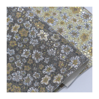 Tissu écologique imperméable à l'eau motif marguerite cendrillon PVC PU cuir synthétique pour la fabrication de chaussures