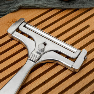 Trancheuse <span class=keywords><strong>à</strong></span> <span class=keywords><strong>fromage</strong></span> transfrontalière avec épaisseur réglable, poignée en alliage d'aluminium, grattoir <span class=keywords><strong>à</strong></span> <span class=keywords><strong>fil</strong></span> en acier inoxydable, gadget de cuisine magique - Product Image 1