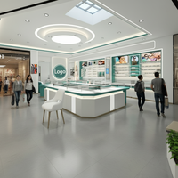 Vitrine de présentation haut de gamme pour bijoux et lunettes, design îlot, dimensions personnalisables, blanc/vert sarcelle, avec compartiment de rangement pour mobile