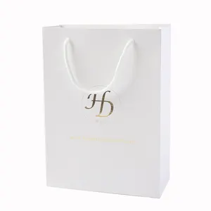 China Competitive Price Elegant Customized Brand Logo Luxury Wine Boutique Shopping White Paper Gift Bags With Ribbon Handles