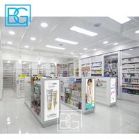 Fabricant d'armoires Étagères de pharmacie blanches sur mesure Mobilier de pharmacie au design moderne Étagère de présentation médicale