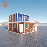 Maison conteneur modulaire habitable sur mesure avec toilettes et douche Panneaux sandwich préfabriqués Immeuble de bureaux plat