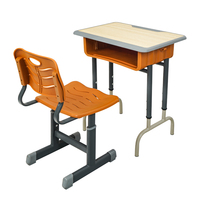 Ensemble bureau et chaise pour étudiant réglable en hauteur avec tiroir de rangement orange pour l'étude à domicile et l'école primaire