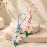 Macaron Lily Leder-Schlüsselanhänger mit Handschlaufe, Mädchenhafte Taschendekoration
