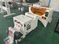 Centre d'impression utilisant une machine d'impression numérique tout-en-un A3 DTF sur film PET pour les boutiques de bricolage personnalisées