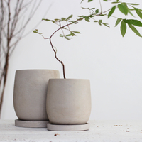 Pot à fleurs en béton de style moderne avec soucoupe pour la décoration de la maison et du jardin