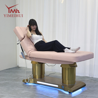 Table de massage électrique de luxe à 4 moteurs avec base dorée et éclairage LED pour salon de beauté